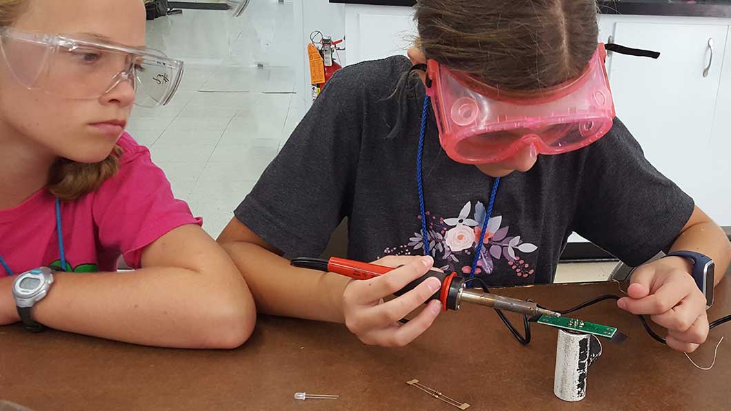 Marine DeTECHtive campers learn to solder