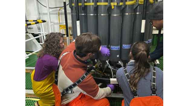 Dr. Brandi Kiel Reese, Caleb Boyd, Hannah Organ (Texas A&amp;M University-Corpus Christi), and Dr. Kanchan Maiti (Louisiana State University) taking water samples from the CTD.